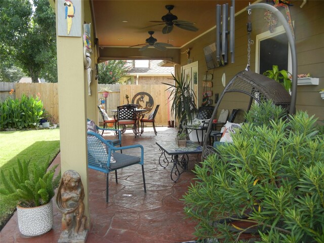 4822 Edgegate Dr, Spring, TX 77373 - view of patio / terrace featuring outdoor dining space and a ceiling fan