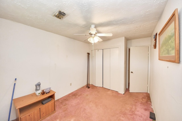 15147 Sheffield Ter, Channelview, TX 77530 - unfurnished bedroom with light carpet, a closet, and a ceiling fan