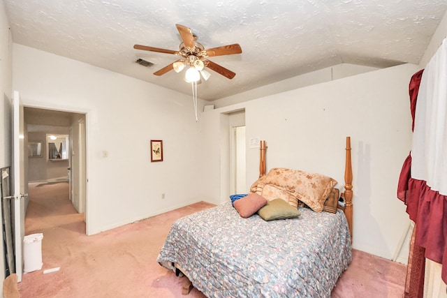 15147 Sheffield Ter, Channelview, TX 77530 - bedroom with light colored carpet, a textured ceiling, a ceiling fan, and vaulted ceiling