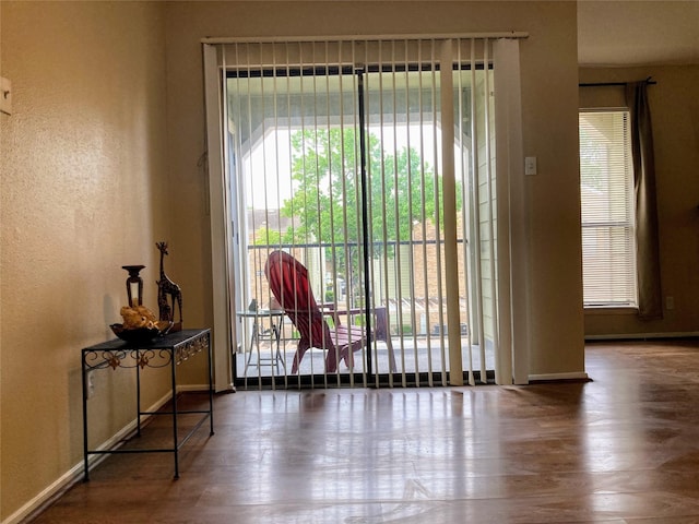 6602 Harbor Town Dr Unit 1008, Houston, TX 77036 - doorway featuring wood finished floors and a textured wall