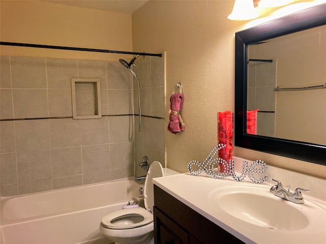 6602 Harbor Town Dr Unit 1008, Houston, TX 77036 - bathroom featuring vanity, shower / bath combination, and a textured wall