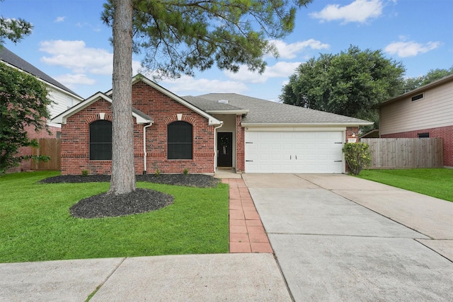 21327 Hadrian Dr, Katy, TX 77449 - ranch-style home with concrete driveway, a garage, roof with shingles, and brick siding