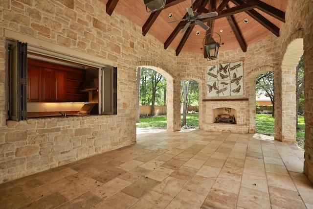 764 Kuhlman Rd, Hunters Creek Village, TX 77024 - view of patio with an outdoor stone fireplace, a ceiling fan, and area for grilling