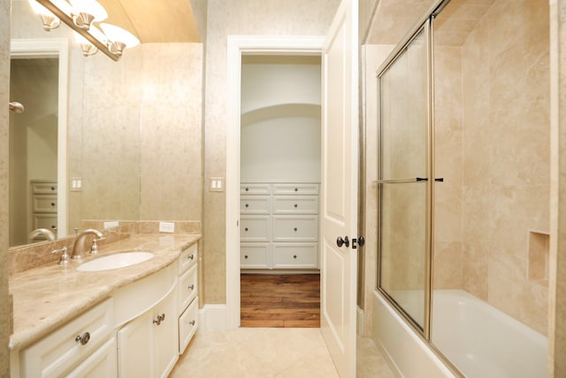 764 Kuhlman Rd, Hunters Creek Village, TX 77024 - bathroom with vanity and shower / bath combination with glass door