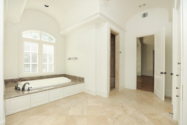 764 Kuhlman Rd, Hunters Creek Village, TX 77024 - full bath featuring a bath and lofted ceiling