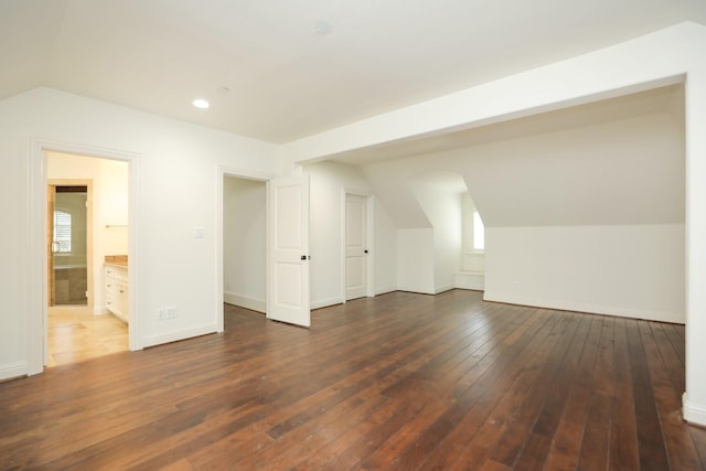 764 Kuhlman Rd, Hunters Creek Village, TX 77024 - additional living space with vaulted ceiling, hardwood / wood-style flooring, and recessed lighting