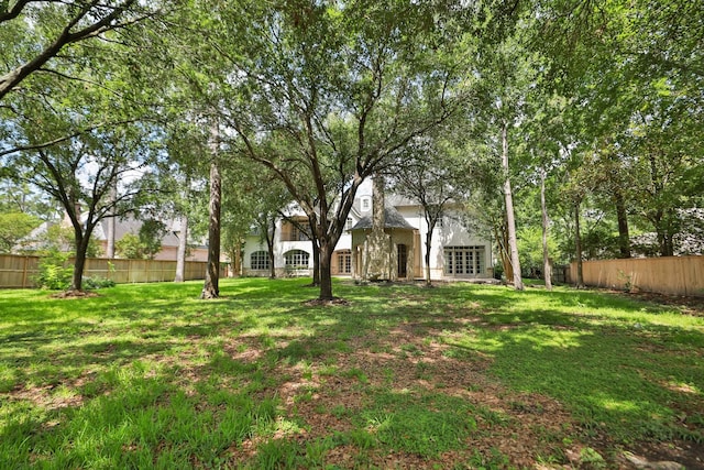764 Kuhlman Rd, Hunters Creek Village, TX 77024 - view of yard featuring french doors