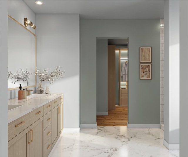 2905 Apple Rose, Katy, TX 77493 - bathroom featuring double vanity, marble tiled flooring, recessed lighting, and a spacious closet