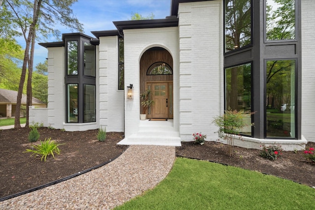 52 Indian Clover, The Woodlands, TX 77381 - view of exterior entry featuring brick siding
