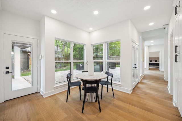 52 Indian Clover, The Woodlands, TX 77381 - dining area featuring light wood-style floors and recessed lighting