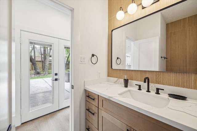 52 Indian Clover, The Woodlands, TX 77381 - bathroom featuring vanity and wood finished floors
