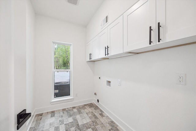 52 Indian Clover, The Woodlands, TX 77381 - laundry room featuring cabinet space, hookup for an electric dryer, and washer hookup
