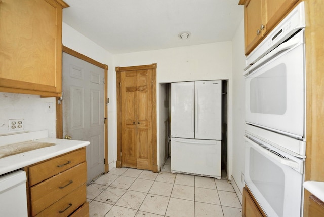 3819 Galway Ln, Houston, TX 77080 - kitchen featuring white appliances, light countertops, and light tile patterned floors