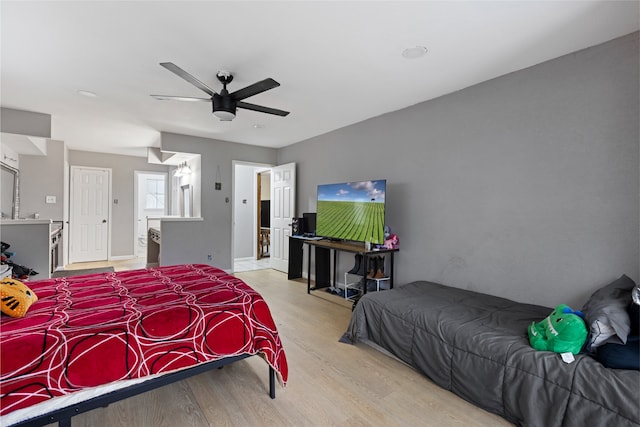 727 Baltic Ln, Houston, TX 77090 - bedroom featuring wood finished floors and ceiling fan
