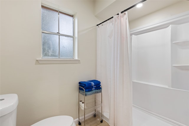 727 Baltic Ln, Houston, TX 77090 - bathroom with toilet and a shower with shower curtain
