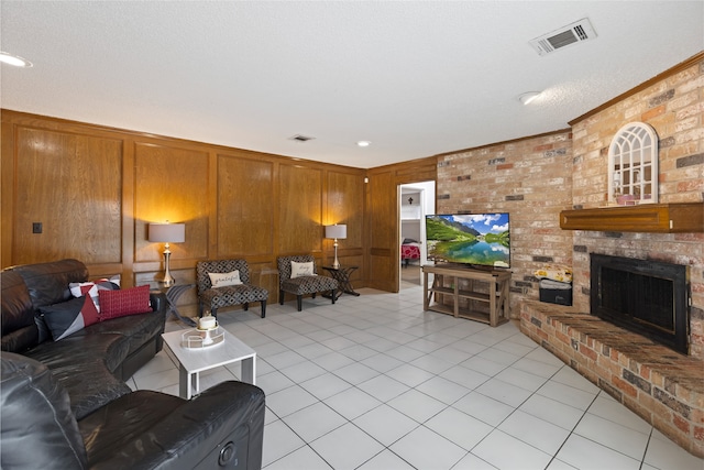 727 Baltic Ln, Houston, TX 77090 - living room featuring light tile patterned floors, a fireplace, and wood walls