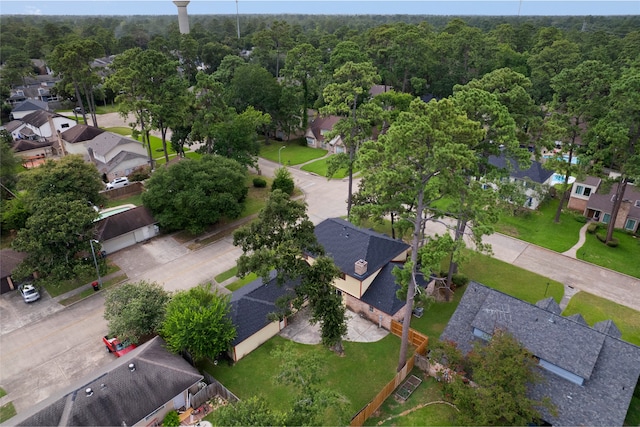 727 Baltic Ln, Houston, TX 77090 - aerial perspective of suburban area with a forest