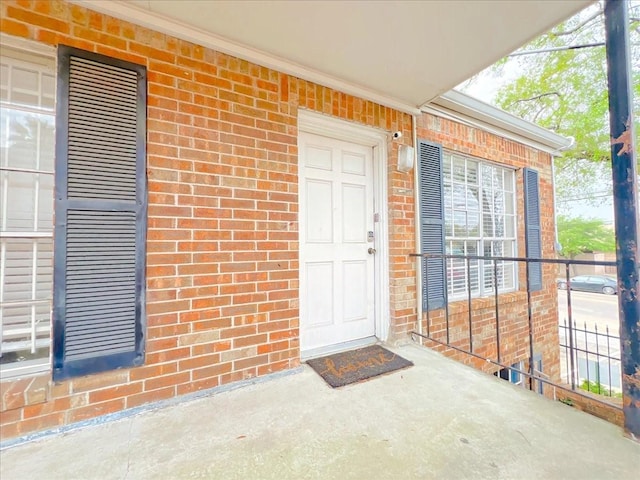 6305 Westward St Unit 106, Houston, TX 77081 - doorway to property with brick siding