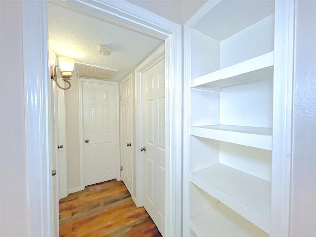 6305 Westward St Unit 106, Houston, TX 77081 - corridor with wood finished floors