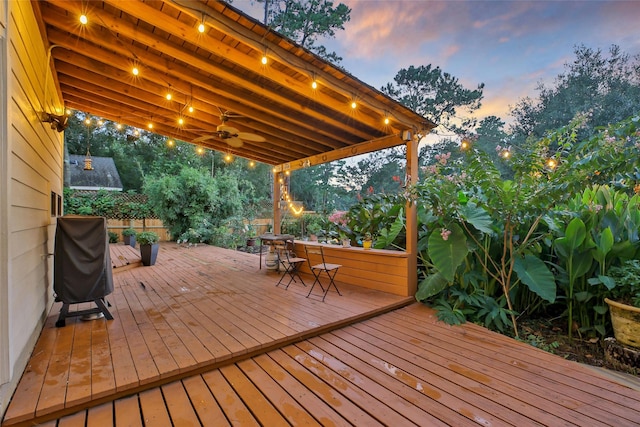 10 Featherfall Pl, Spring, TX 77381 - deck at dusk with a grill and a ceiling fan