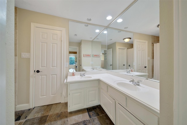 10 Featherfall Pl, Spring, TX 77381 - full bath featuring double vanity and recessed lighting