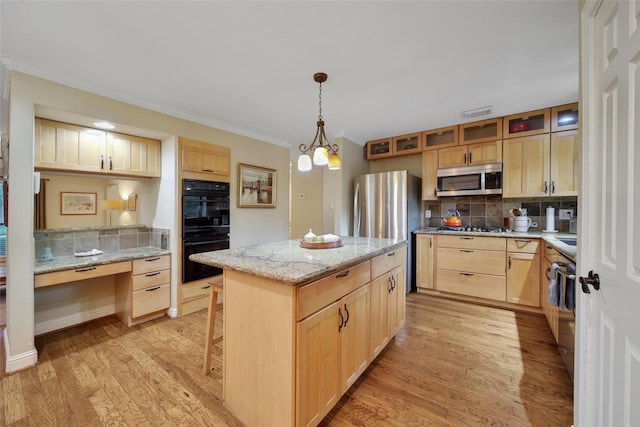 10 Featherfall Pl, Spring, TX 77381 - kitchen with light brown cabinetry, light wood-style floors, backsplash, crown molding, and glass insert cabinets