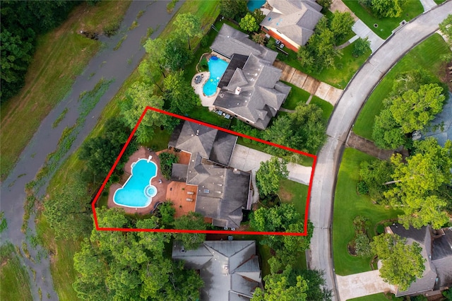 10 Featherfall Pl, Spring, TX 77381 - aerial view of property's location featuring a pool and property boundaries highlighted