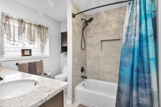 5934 Foresthaven Dr, Houston, TX 77066 - bathroom featuring shower / bath combination with curtain, vanity, and a textured ceiling