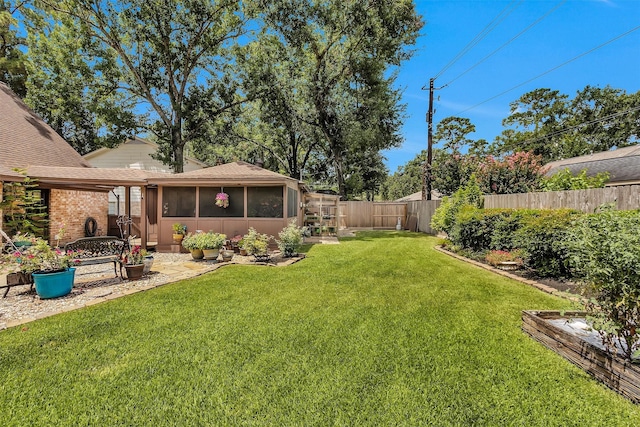 5934 Foresthaven Dr, Houston, TX 77066 - fenced backyard featuring a sunroom