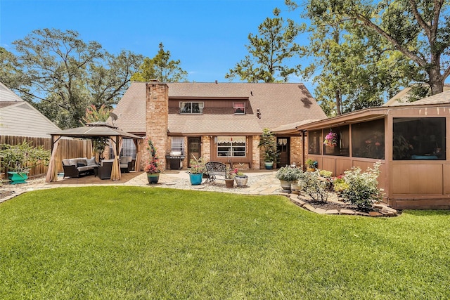 5934 Foresthaven Dr, Houston, TX 77066 - back of property with a shingled roof, an outdoor hangout area, a gazebo, a patio area, and brick siding