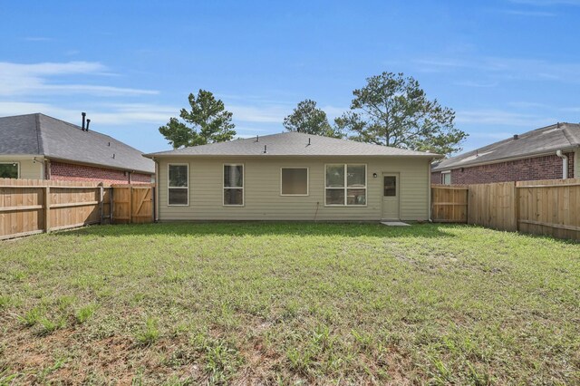 23911 Pinecreek Pt, Spring, TX 77373 - back of house with a fenced backyard