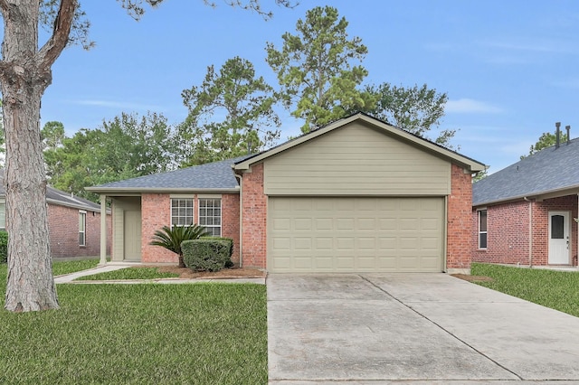 23911 Pinecreek Pt, Spring, TX 77373 - single story home featuring driveway, a garage, a front lawn, and brick siding