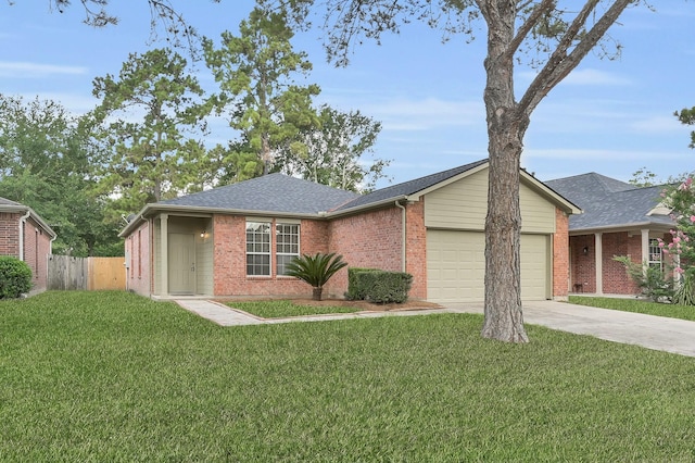 23911 Pinecreek Pt, Spring, TX 77373 - ranch-style house featuring an attached garage, brick siding, a shingled roof, and driveway