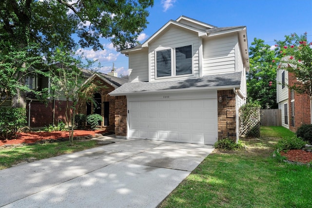 4303 Appalachian Trl, Houston, TX 77345 - traditional-style home featuring concrete driveway, a shingled roof, a garage, and brick siding
