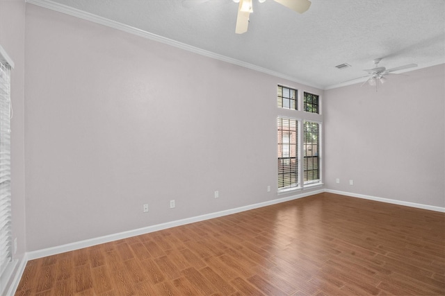 4303 Appalachian Trl, Houston, TX 77345 - unfurnished room featuring a ceiling fan, crown molding, wood finished floors, and a textured ceiling