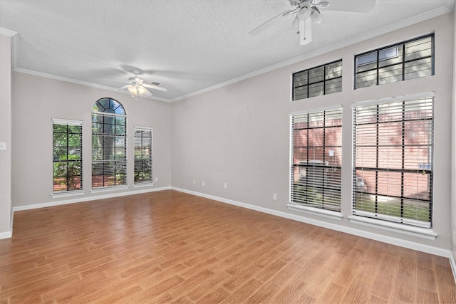 4303 Appalachian Trl, Houston, TX 77345 - unfurnished room with ceiling fan, light wood-style floors, a textured ceiling, and crown molding