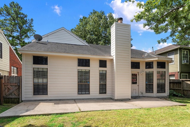 4303 Appalachian Trl, Houston, TX 77345 - rear view of house with roof with shingles, a patio area, and a chimney
