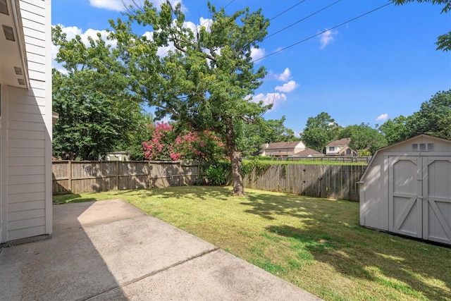 4303 Appalachian Trl, Houston, TX 77345 - fenced backyard with a storage unit and a patio