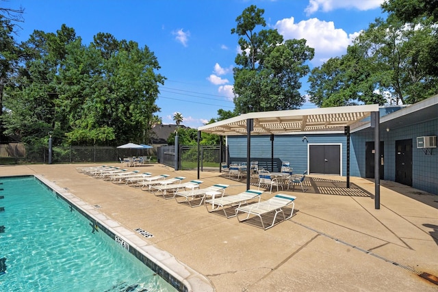 4303 Appalachian Trl, Houston, TX 77345 - community pool with a patio, a pergola, and a wall mounted air conditioner