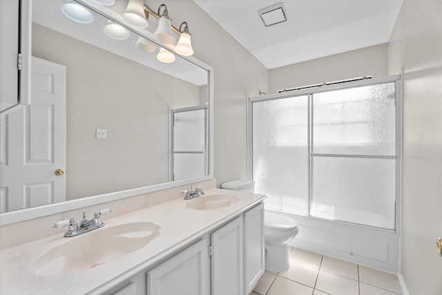 4303 Appalachian Trl, Houston, TX 77345 - full bathroom featuring tile patterned flooring, double vanity, and bath / shower combo with glass door