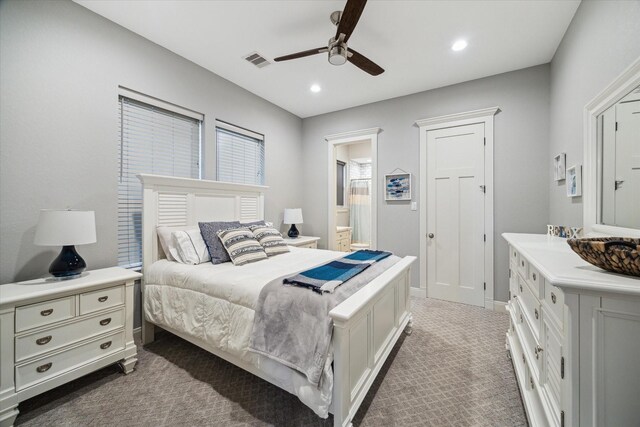 3848 S Main St, Anahuac, TX 77514 - carpeted bedroom with recessed lighting, ensuite bathroom, and a ceiling fan