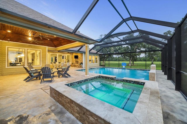 3848 S Main St, Anahuac, TX 77514 - view of pool with a patio area, a pool with connected hot tub, glass enclosure, and a ceiling fan