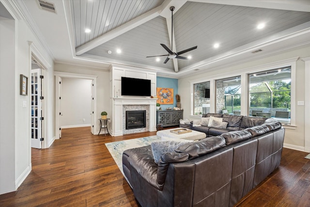 3848 S Main St, Anahuac, TX 77514 - living room with ceiling fan, dark wood-style floors, crown molding, recessed lighting, and a fireplace