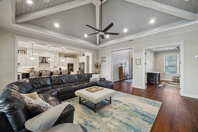 3848 S Main St, Anahuac, TX 77514 - living room featuring a ceiling fan, dark wood finished floors, recessed lighting, beam ceiling, and a tray ceiling