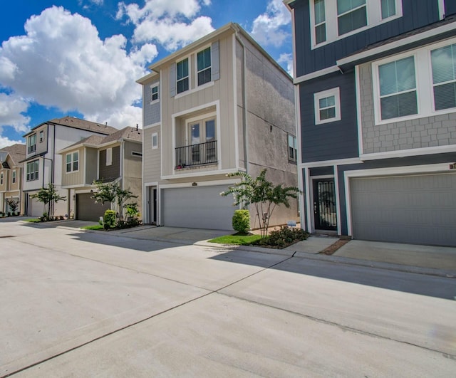 1912 Honey Mound Dr, Houston, TX 77080 - view of front facade with a garage, driveway, and a residential view