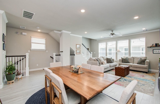 1912 Honey Mound Dr, Houston, TX 77080 - dining area with recessed lighting, ornamental molding, light wood-style floors, stairs, and a ceiling fan