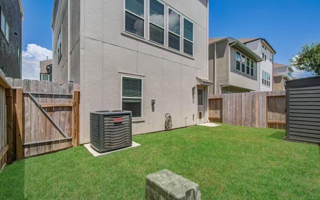 1912 Honey Mound Dr, Houston, TX 77080 - rear view of property featuring stucco siding, a fenced backyard, and a gate