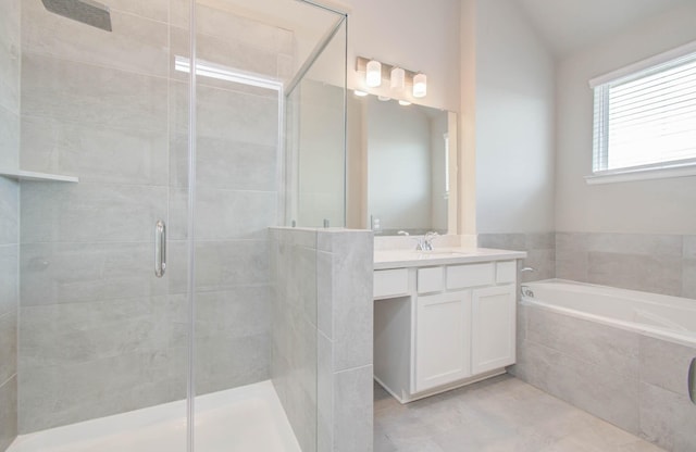 1912 Honey Mound Dr, Houston, TX 77080 - full bath featuring a shower stall, vanity, a garden tub, and tile patterned flooring