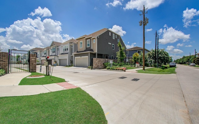 1912 Honey Mound Dr, Houston, TX 77080 - view of concrete street featuring sidewalks, a residential view, a gate, and curbs