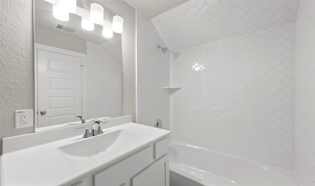 1912 Honey Mound Dr, Houston, TX 77080 - full bathroom with vanity,  shower combination, and a textured wall